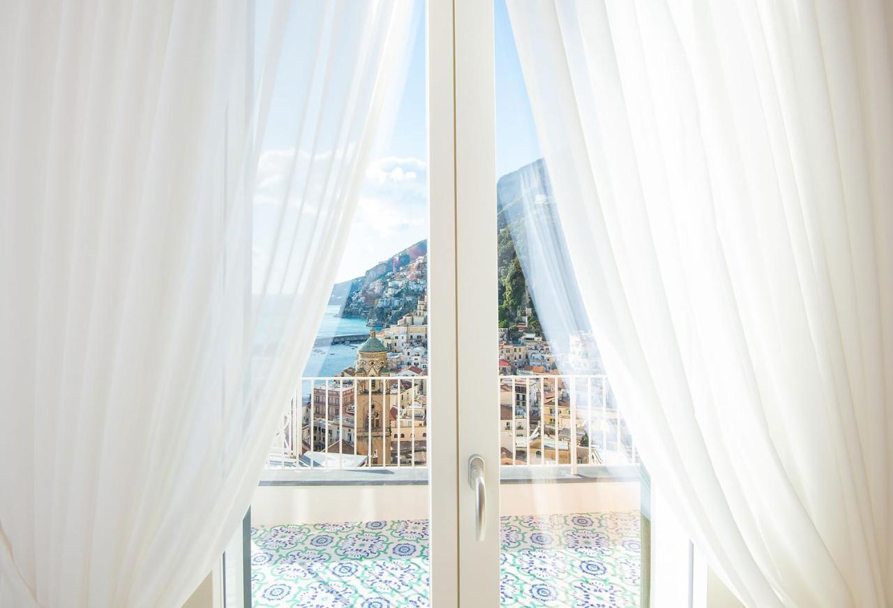 Amore Rentals - Palazzo Della Storia Amalfi Exterior photo